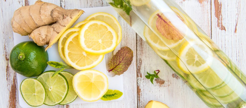 Infused water with fruit, lemons, limes showing the importance of hydration for medical weight loss with GLP-1 prescriptions