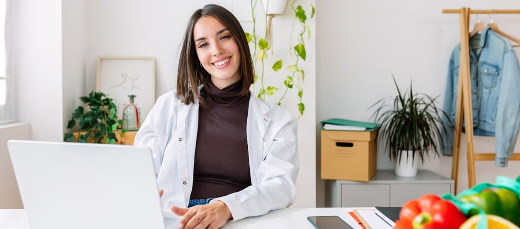 Medical provider seeing GLP-1 medical weight loss patient in office discussing the importance of hydration and clear fluids for weight loss