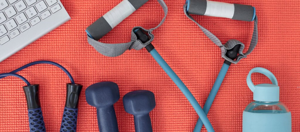 Exercise equipment on a yoga mat showing the importance of prioritizing movement for weight loss with GLP-1 prescriptions like Ozempic, Wegovy, & Mounjaro