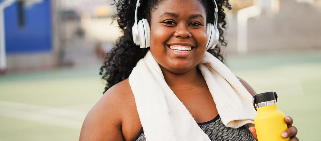 Lady exercises on hot day outside to promote overall health while taking GLP-1 Semaglutide on a medical weight loss journey