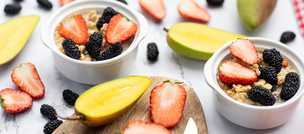 Oatmeal with fruit and berries for breakfast showing examples of natural GLP-1 supplements and strategies for weight loss