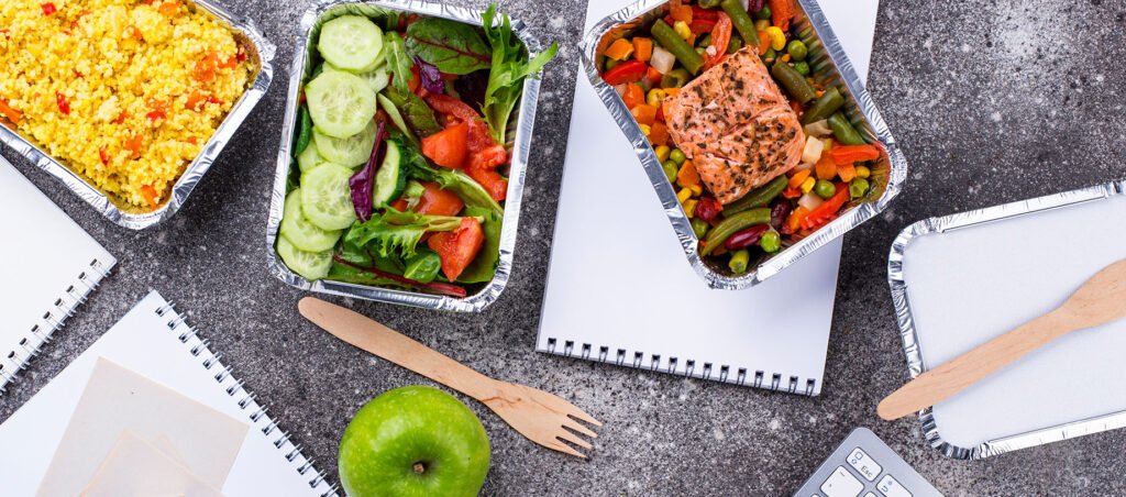 Image with a day's worth of meals on table for patient prioritizing high-protein food on a medical weight loss journey with a GLP-1 prescription